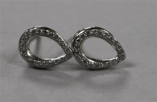A modern pair of platinum and diamond ovoid openwork earrings, 10mm.